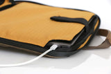 Charge the laptop while in its case